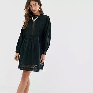 Black textured high neck mini smock dress with lace trim